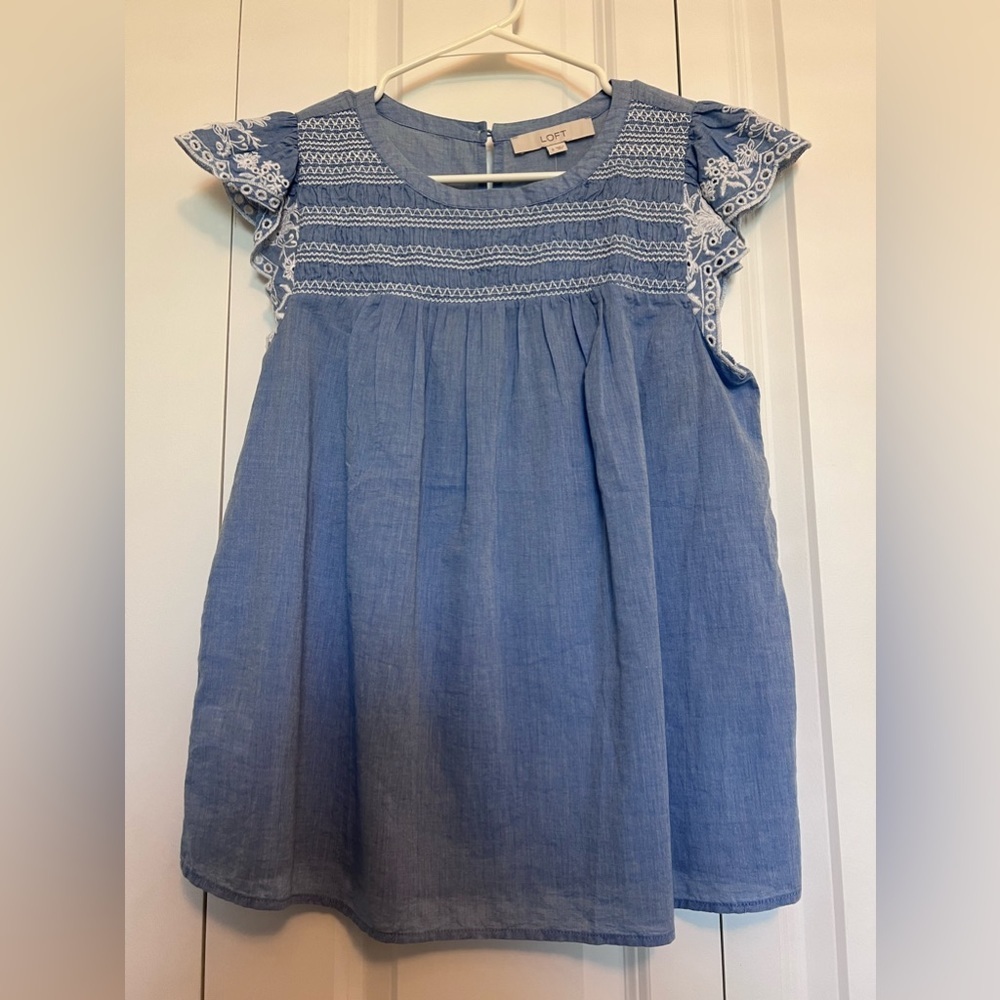 Loft sleeveless light blue top with embroidery front and cap sleeves. NWT